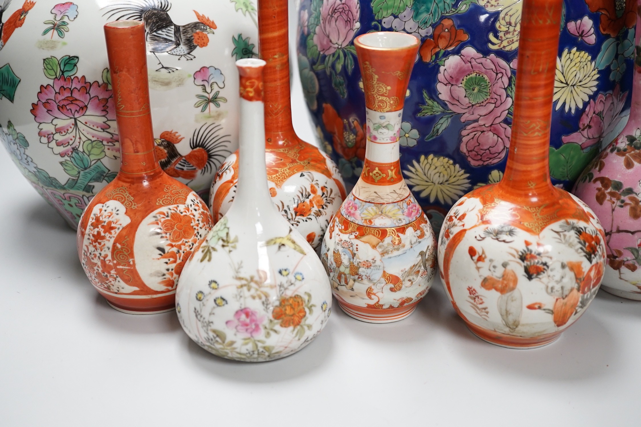 6 Japanese Kutani porcelain bottle vases together with two Chinese famille rose jars and covers, tallest 24cm